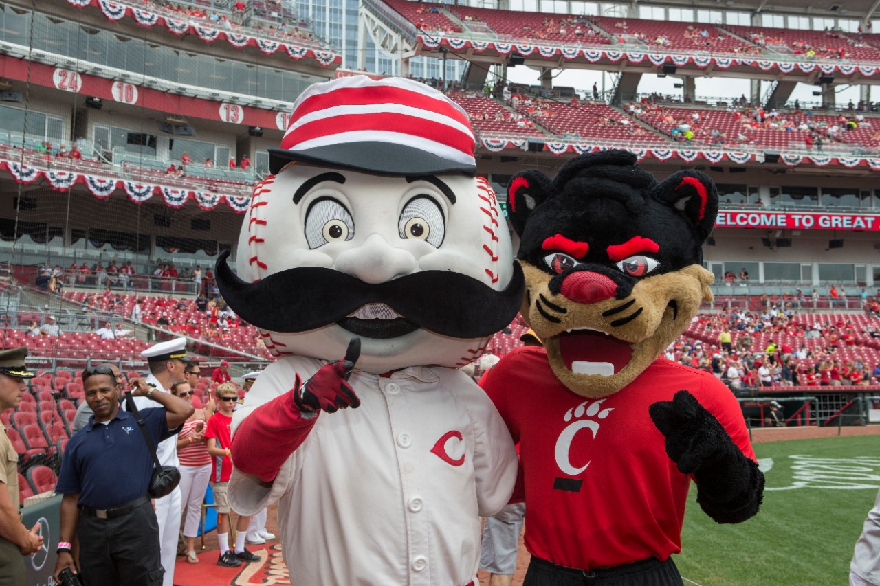 Goering Center Family Business Day at Great American Ballpark. Bearcat with Reds mascot