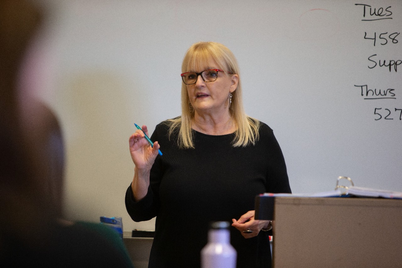 Lori Krafte, law adjunct professor, teaching in class