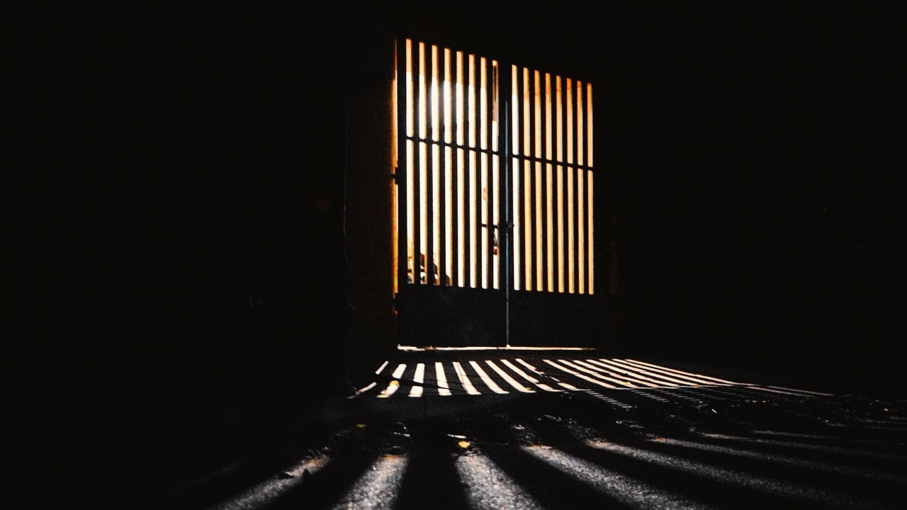 view of dark prison cell entrance 