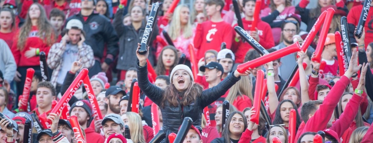 Students cheer the UC Bearcats football team from Nippert Stadium.