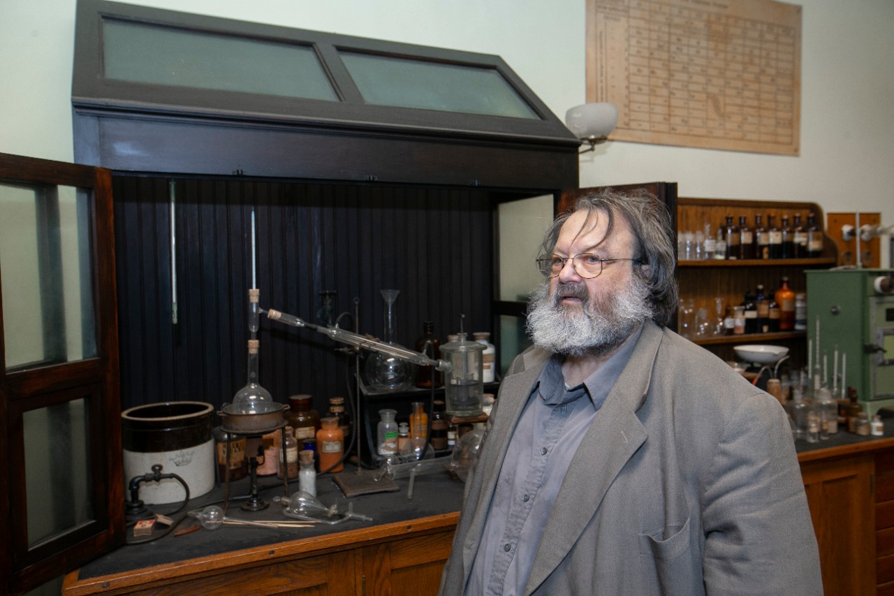 Professor emeritus William Jensen, PhD shown here in the Chemistry Museum at Rieveschl. UC/Joseph Fuqua II