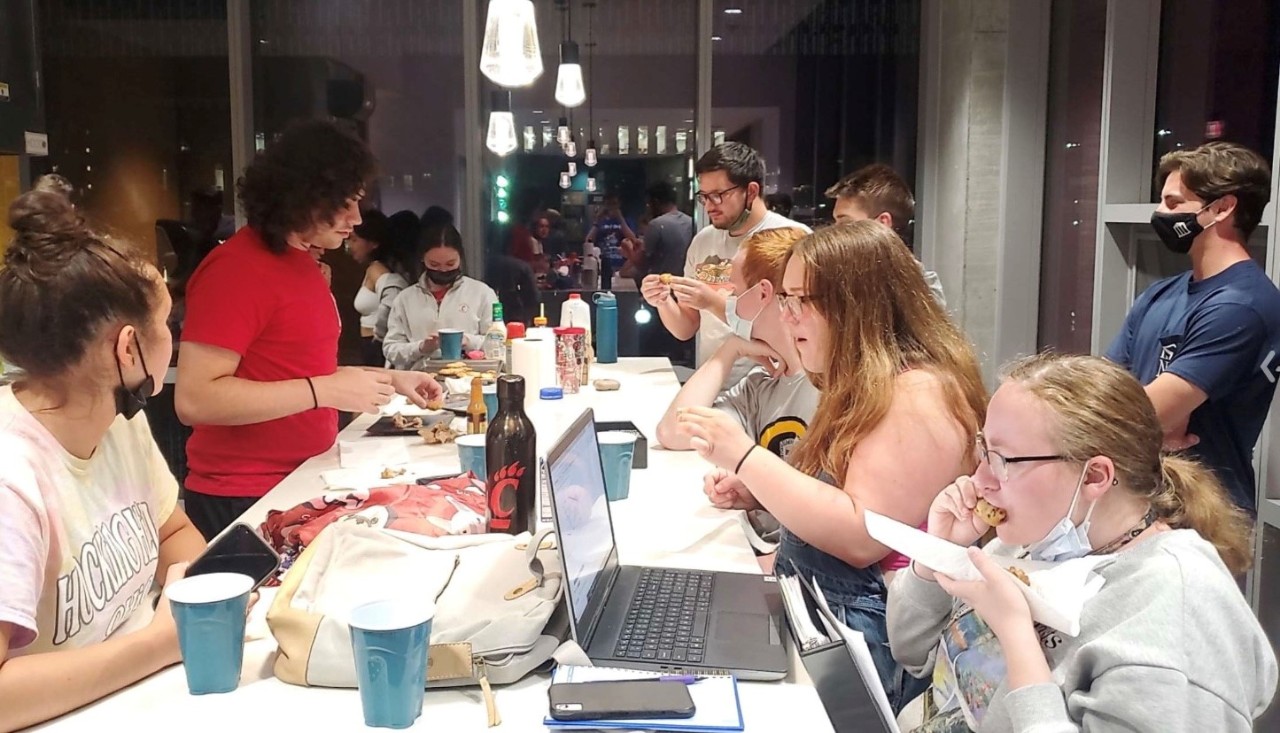 Students working at a table on an activitiy