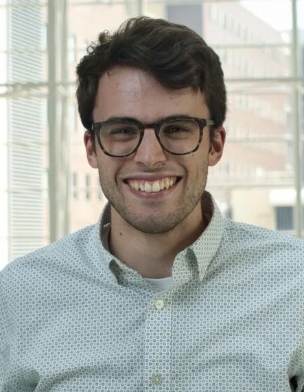 person standing in front of window