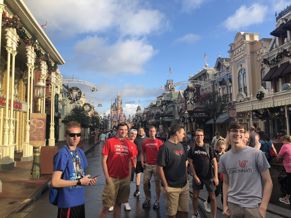 Several UC students shown at a Disney World attraction during an annual visit to Orlando, Florida