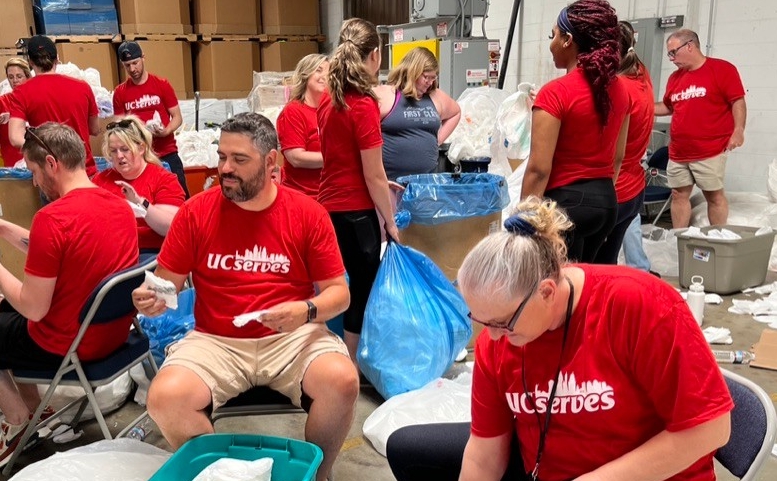 UC Online employees sort through donations at Matthew 25: Ministries 