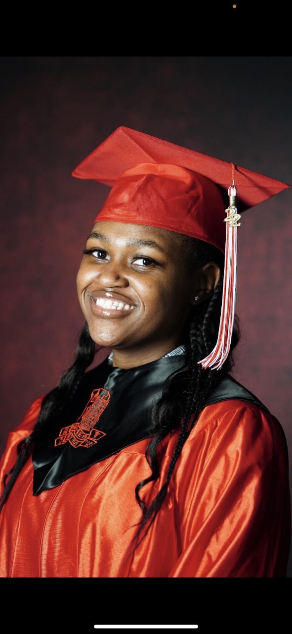 Benya Coleman in graduation apparel.