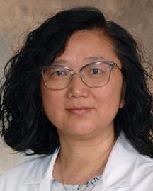 YU (AGNES) LUO WITH UC LAB COAT  MOLECULAR GENETICS