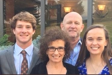 The Klaserner family smiling together