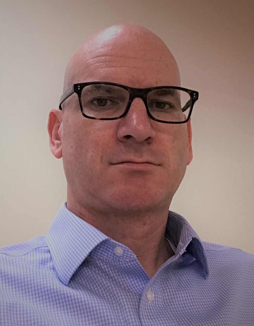 A portrait of CCM staff member Troy A. Brizius.