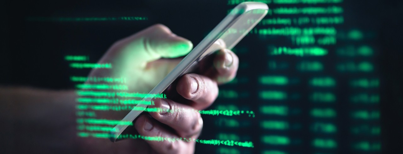 person on cell phone scrolling through information