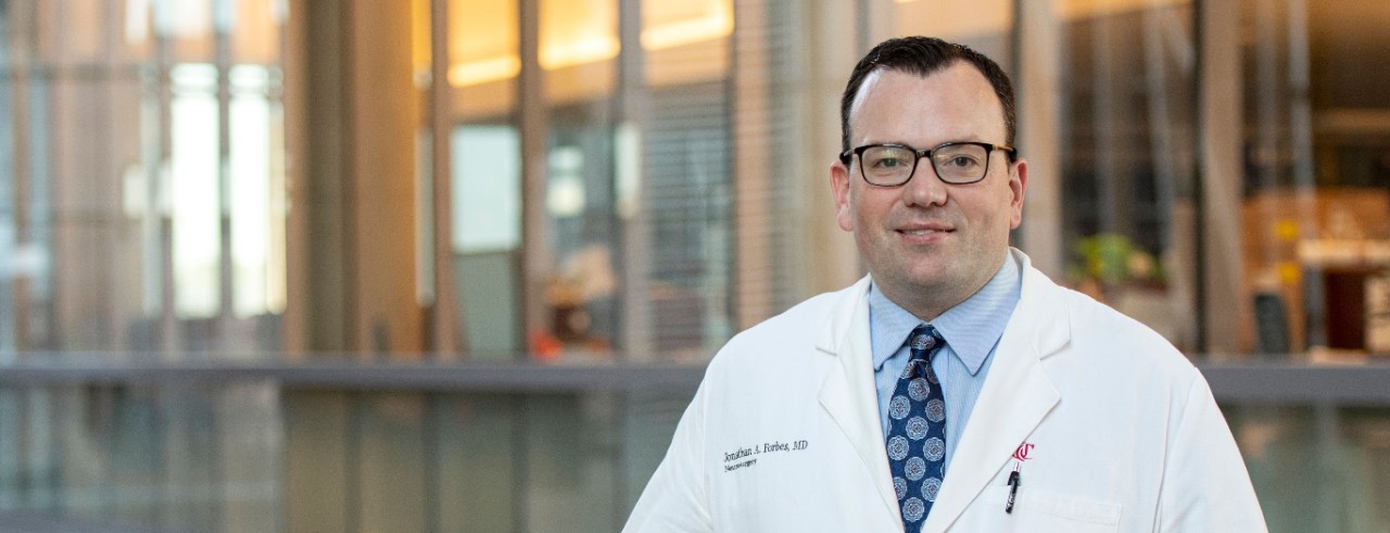 man in white lab coat