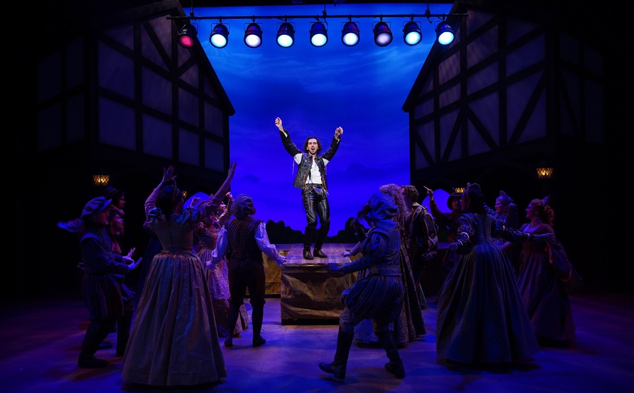 A group of students in Renaissance clothes dance in a dress rehearsal photo from CCM's Oct. 2022 production of "Something Rotten!" Photo/Mark Lyons