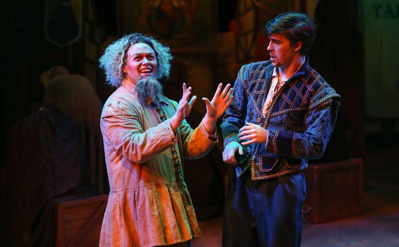 Two students n Renaissance clothes converse in a dress rehearsal photo from CCM's Oct. 2022 production of "Something Rotten!" Photo/Mark Lyons