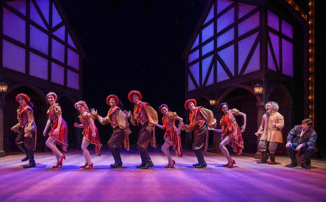 A group of students in Renaissance clothes dance in a dress rehearsal photo from CCM's Oct. 2022 production of "Something Rotten!" Photo/Mark Lyons