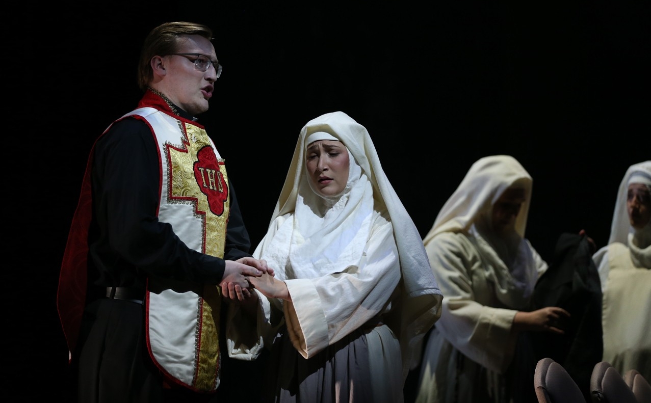 CCM students dressed as nuns and a chaplain perform in a dress rehearsal photo from CCM's Nov. 2022 production of "Dialogues of the Carmelites" Photo/Mark Lyons