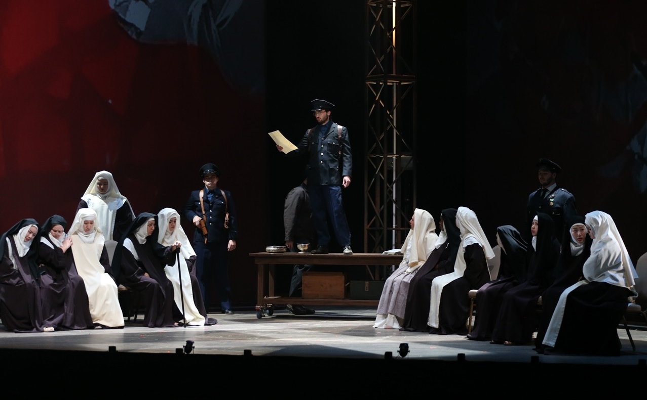 CCM students dressed as soldiers and nuns perform in a dress rehearsal photo from CCM's Nov. 2022 production of "Dialogues of the Carmelites" Photo/Mark Lyons