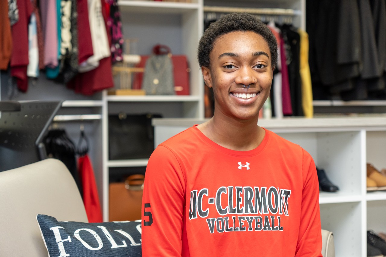 Kayla Williams smiles in a UC Clermont volleyball shirt