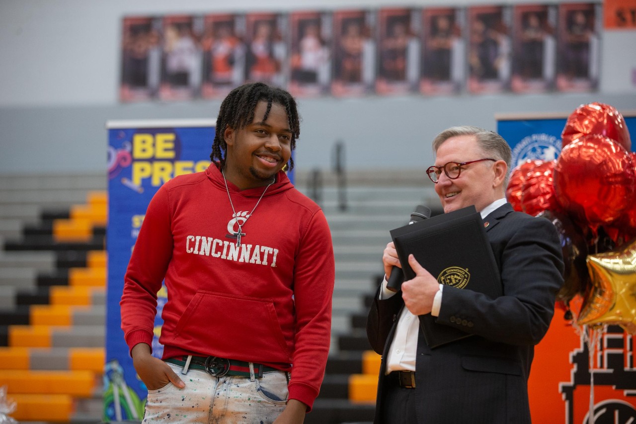 UC surprises Jaylen Green and Jamiah Mixon with their acceptance letters and Marian Spencer Scholarships on Decision Day.