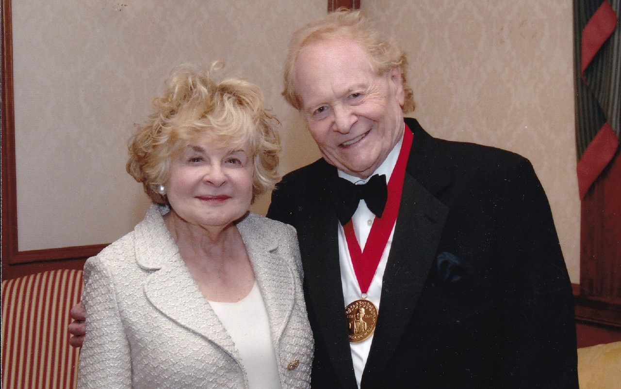 man and woman standing together