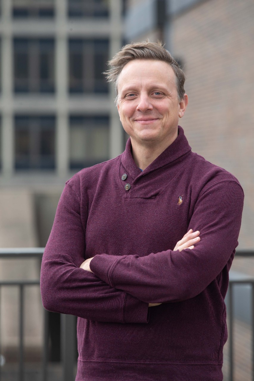 UC student Tyler Boggs and UC associate professor Joshua Gross, shown here in their lab, have new studies coming out on Mexican blind cave fish.
