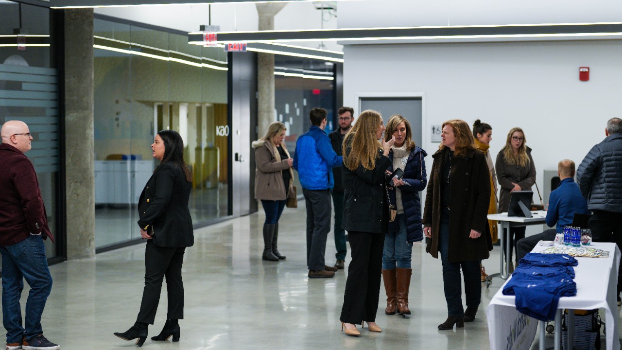 Attendees mingle at the Women in Analytics’ Think and Drink event at the University of Cincinnati's 1819 Innovation Hub.