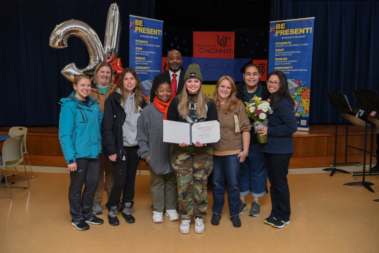 Jack Miner, Vice Provost for Enrollment Management surprised Amelia Tyson-Mueller future UC Bearcats with Marian Spencer Scholarship awards at Clark High School Tuesday January 31, 2023. Marian Spencer Scholarship  award students with full tuition, room and board and an all-expenses-paid study abroad experience from the University of Cincinnati. Photos by Joseph Fuqua II