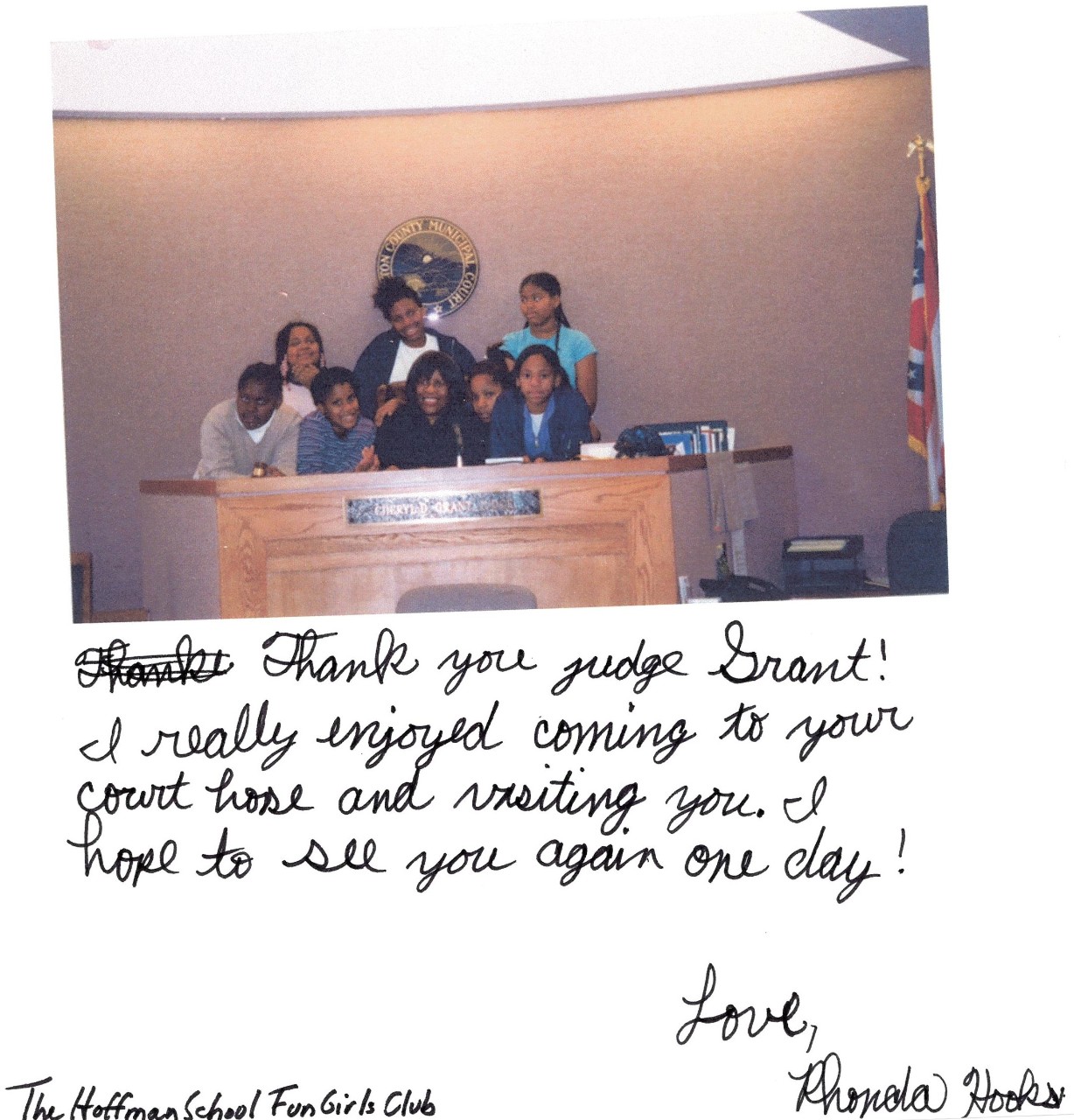 Grant in her court with schoolchildren 