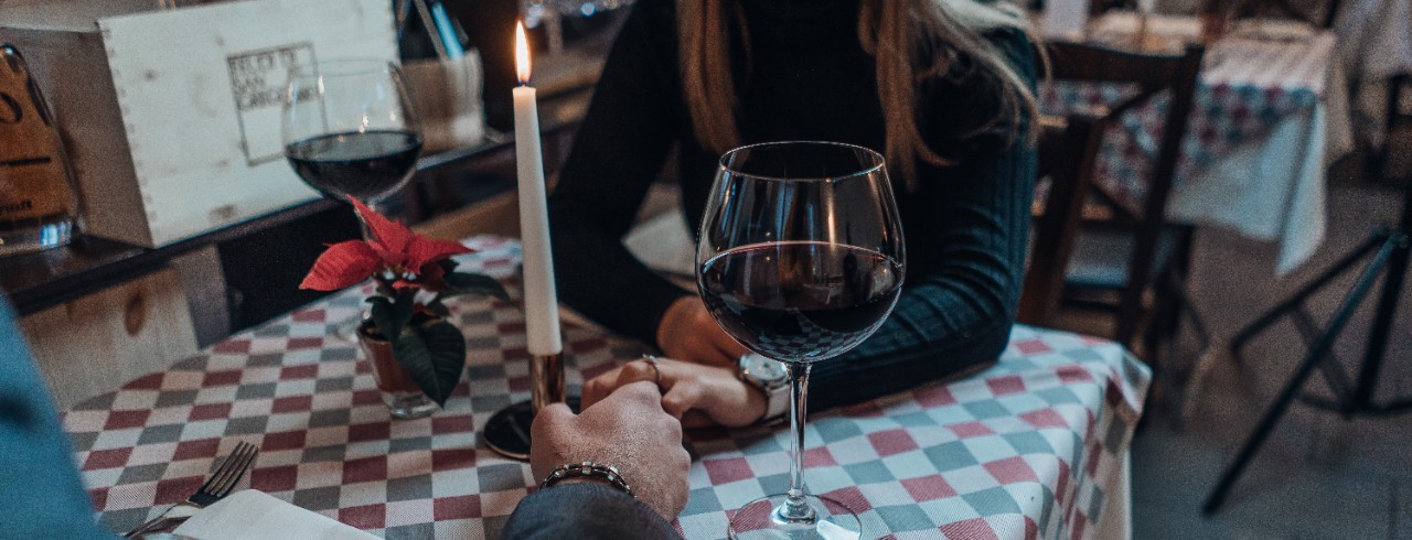 A man and a woman on a dinner date.