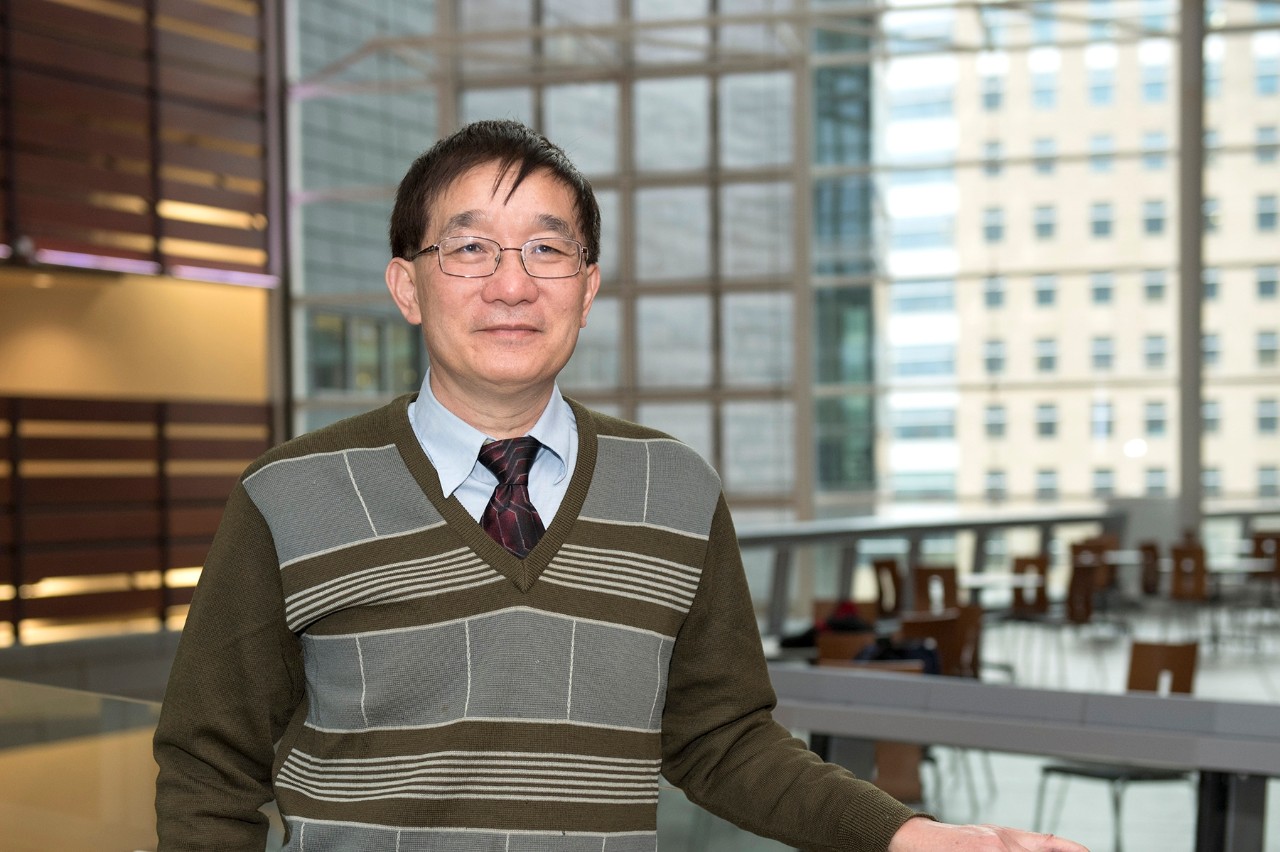 Bingfang Yan, PhD, Pharmacy in his lab and on the CARE Crawley bridge.