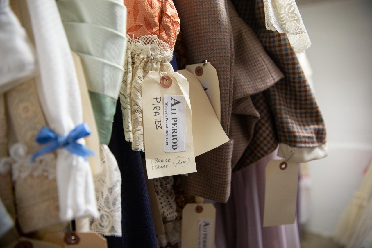 Assistant Professor of Art History Chris Platts takes his Honors Program Seminar students to uncover the hidden collections of UC and the hidden stories that accompany many of the items, artifacts, instruments, costumes, and other things squirreled away in various buildings, libraries, and depositories on campus. Here they visit CCM’s Special Collections at the Albino Gorno Memorial Library and the Historic Costume Collection in Theatre Arts.