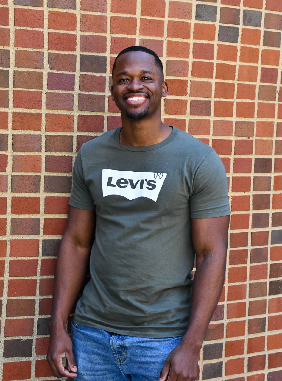 Portrait of Marshawn Amison in a Levi's T-shirt and jeans.