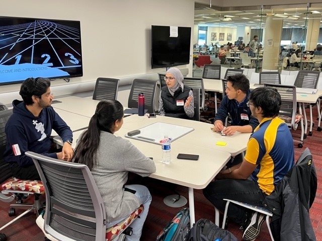students sitting at a table