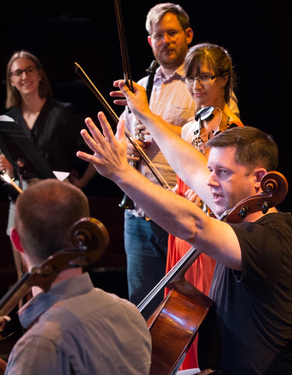 A photo of Nick Photinos (bottom right) working with students. Photo/Kirby Russell