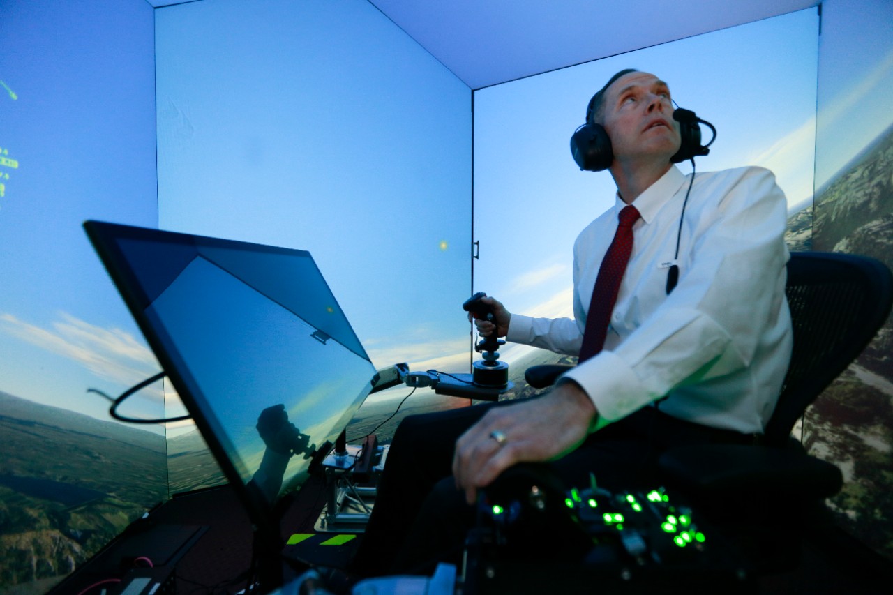 Simulator at Wright Patt Air Force Base. Retired United States Air Force Colonel Gene Lee, in a flight simulator, takes part in simulated air combat versus artificial intelligence technology developed by a team comprised of industry, U.S. Air Force and University of Cincinnati representatives.