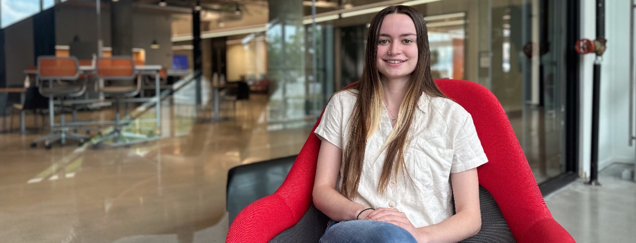 Olivia Bransford sits inside a pod at the 1819 Innovation Hub.