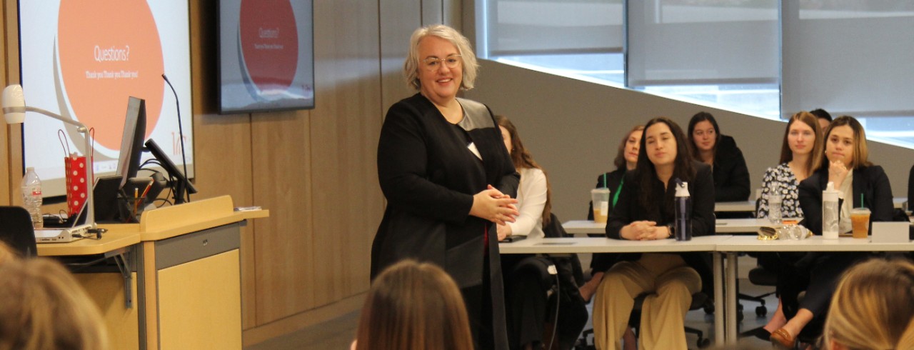 Lindner professor Melinda Hubbard presents to a class in a classroom in Lindner Hall.