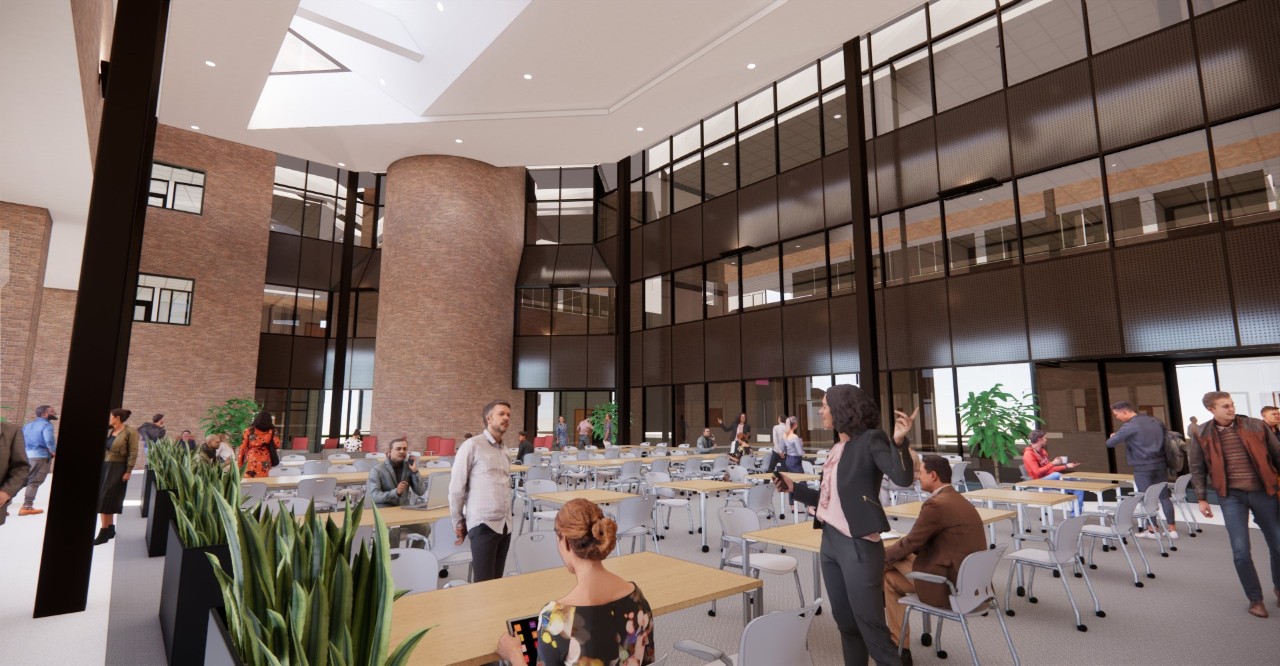 Image of faculty, students and staff interacting in UC Blue Ash's Muntz Hall