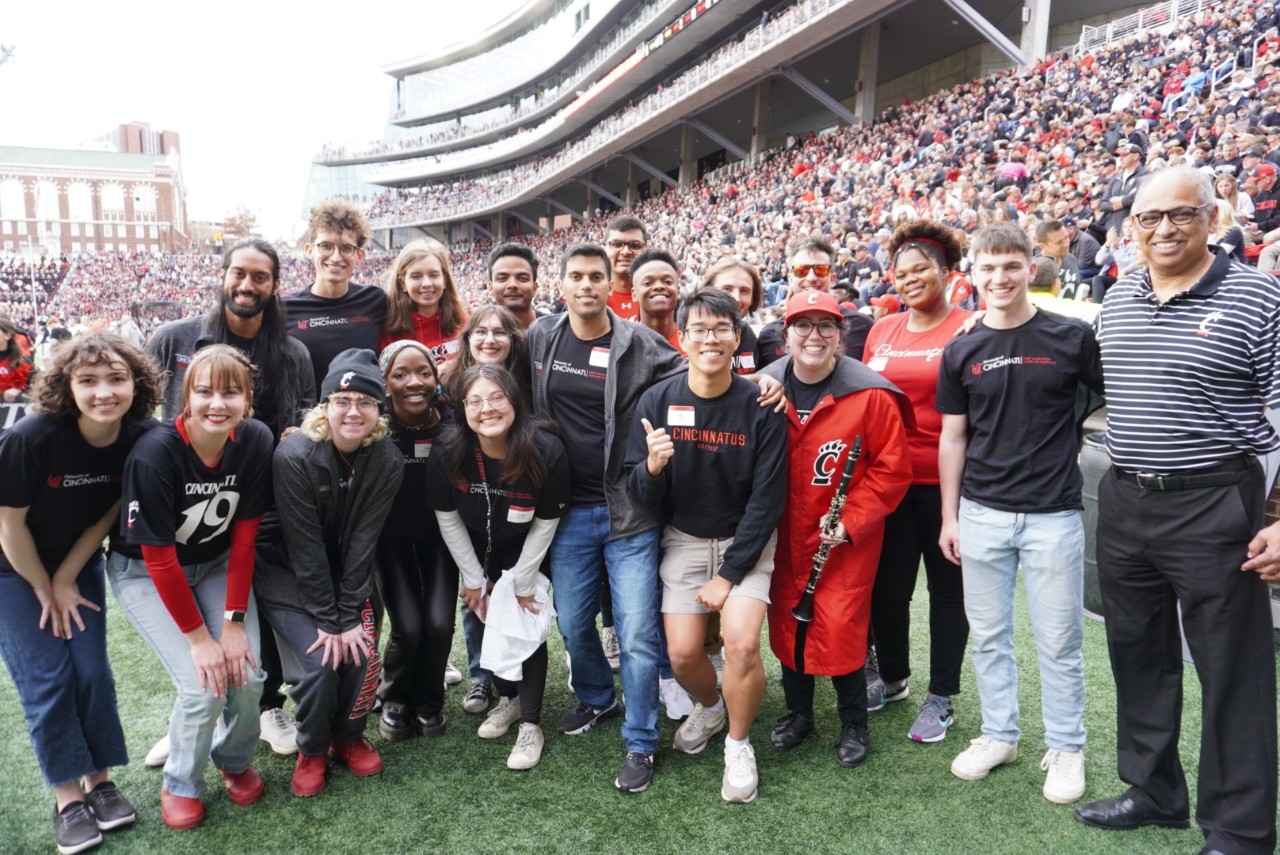 Max Kemats, standing to the left of UC President Neville G. Pinto, with the NEXT Innovation Scholars. 