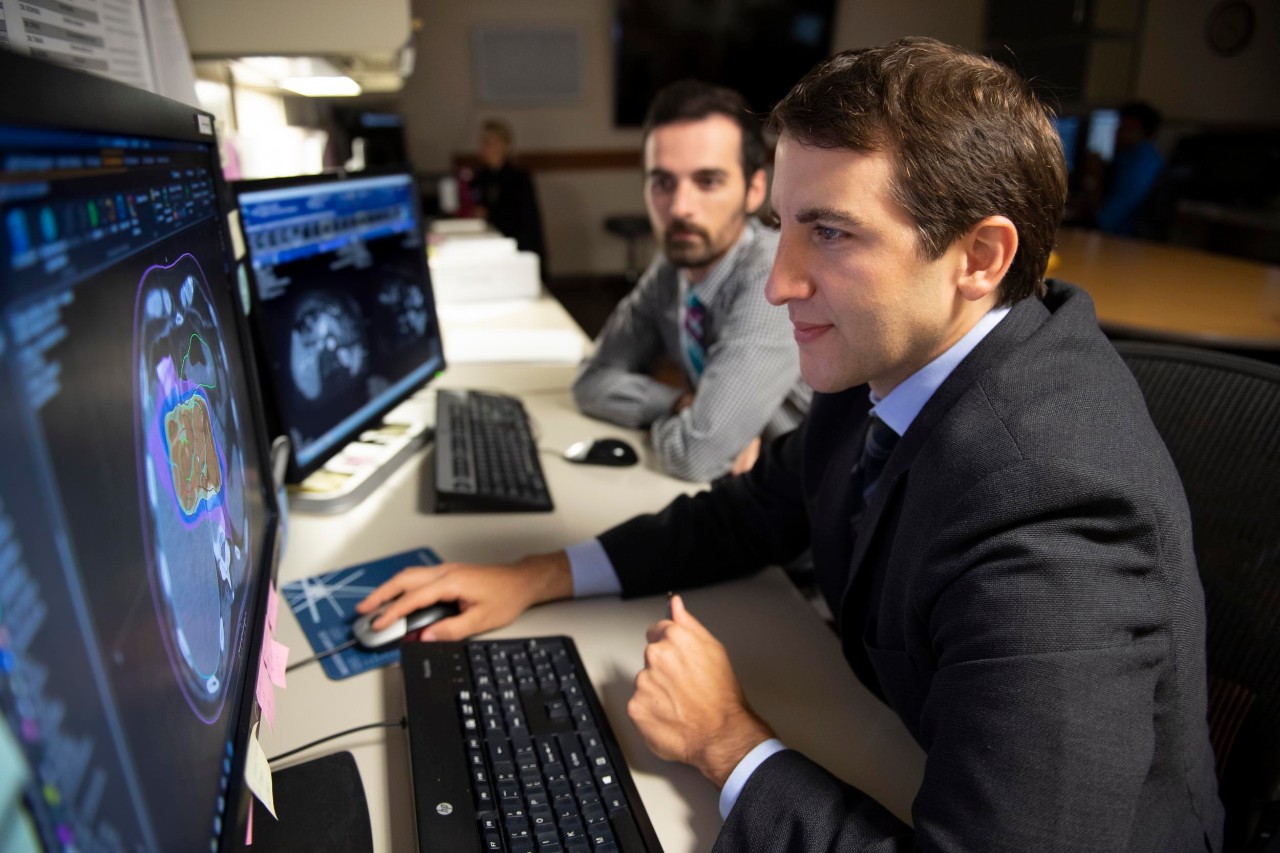 Jordan Kharofa, MD, with Max Richardson, Medical Dosimetrist, in the Barrett Center.