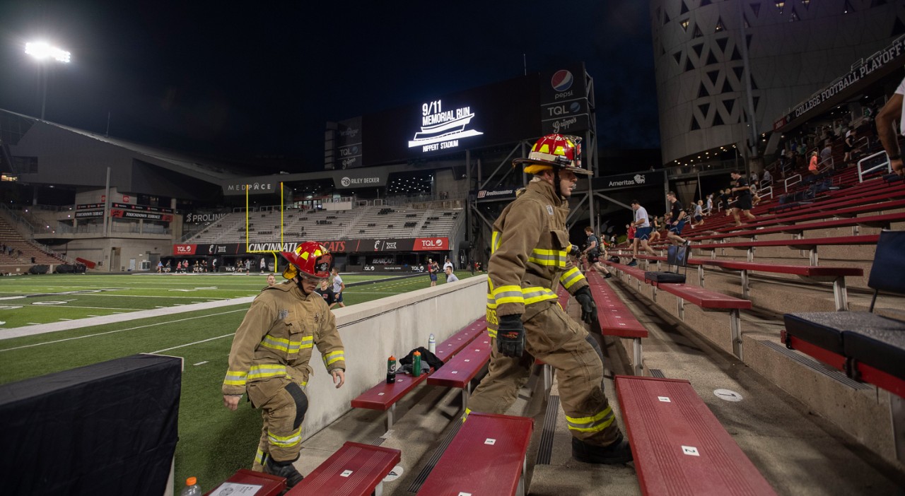 Ludlow Firefighter ran up the stairs during the annual 9/11 Memorial Run at Nippert Stadium Monday September 11, 2023. Veterans Programs & Services Office, who organized the event with UC’s Army and Air Force ROTC detachments. Hundreds scale Nippert Stadium stairs in vow never to forget the victims of the Sept. 11, 2001, terrorist attacks. Photos by Joseph Fuqua II