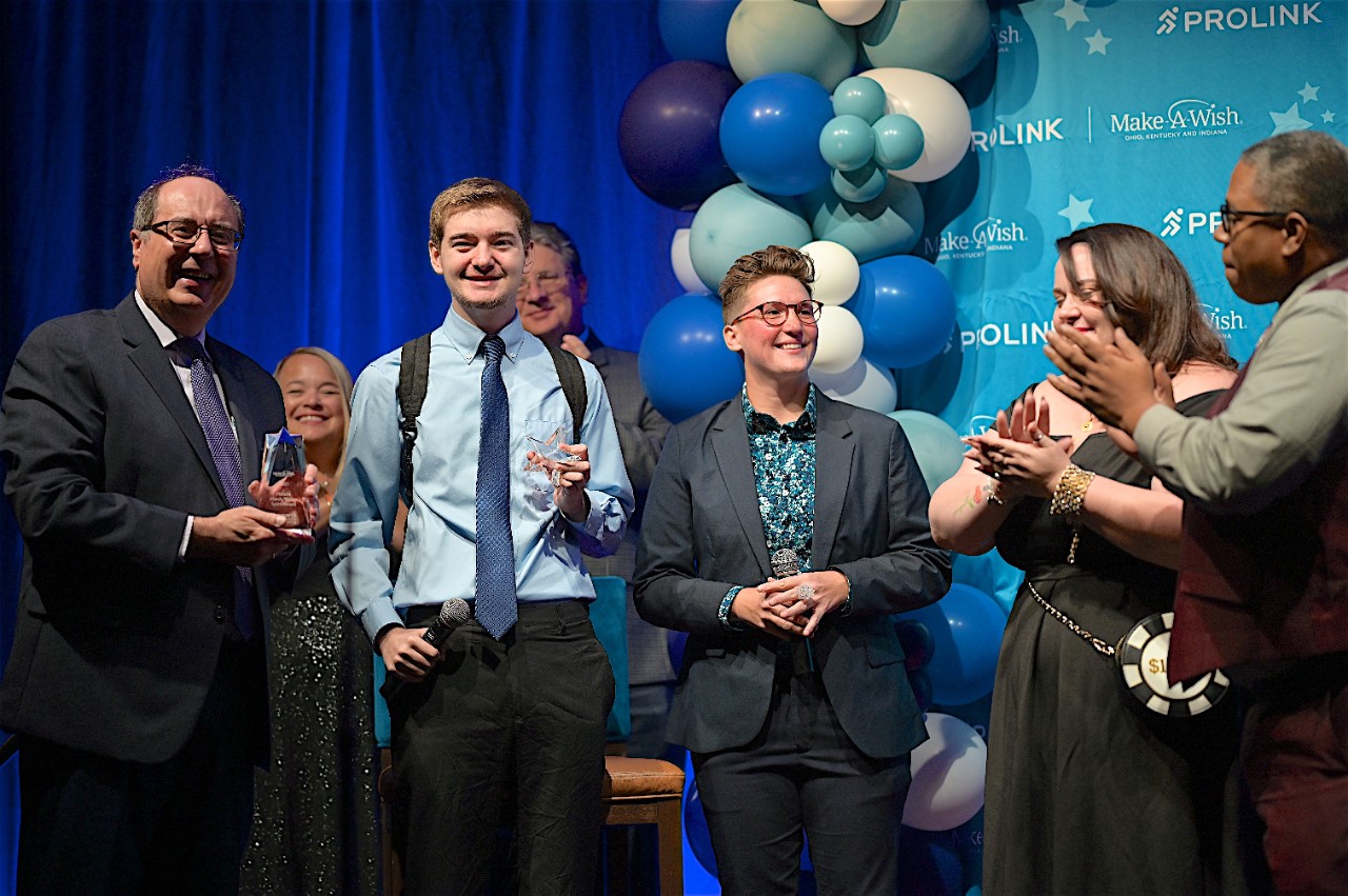 Hoxworth receiving award at gala