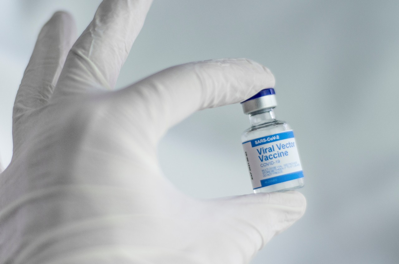 Picture of hand holding Covid vaccine