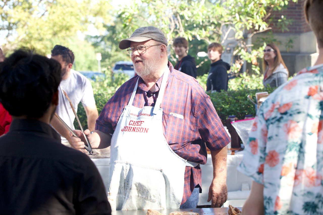 Dean Johnson socializes during the final Welcome Back BBQ under his watch 9/15. 
