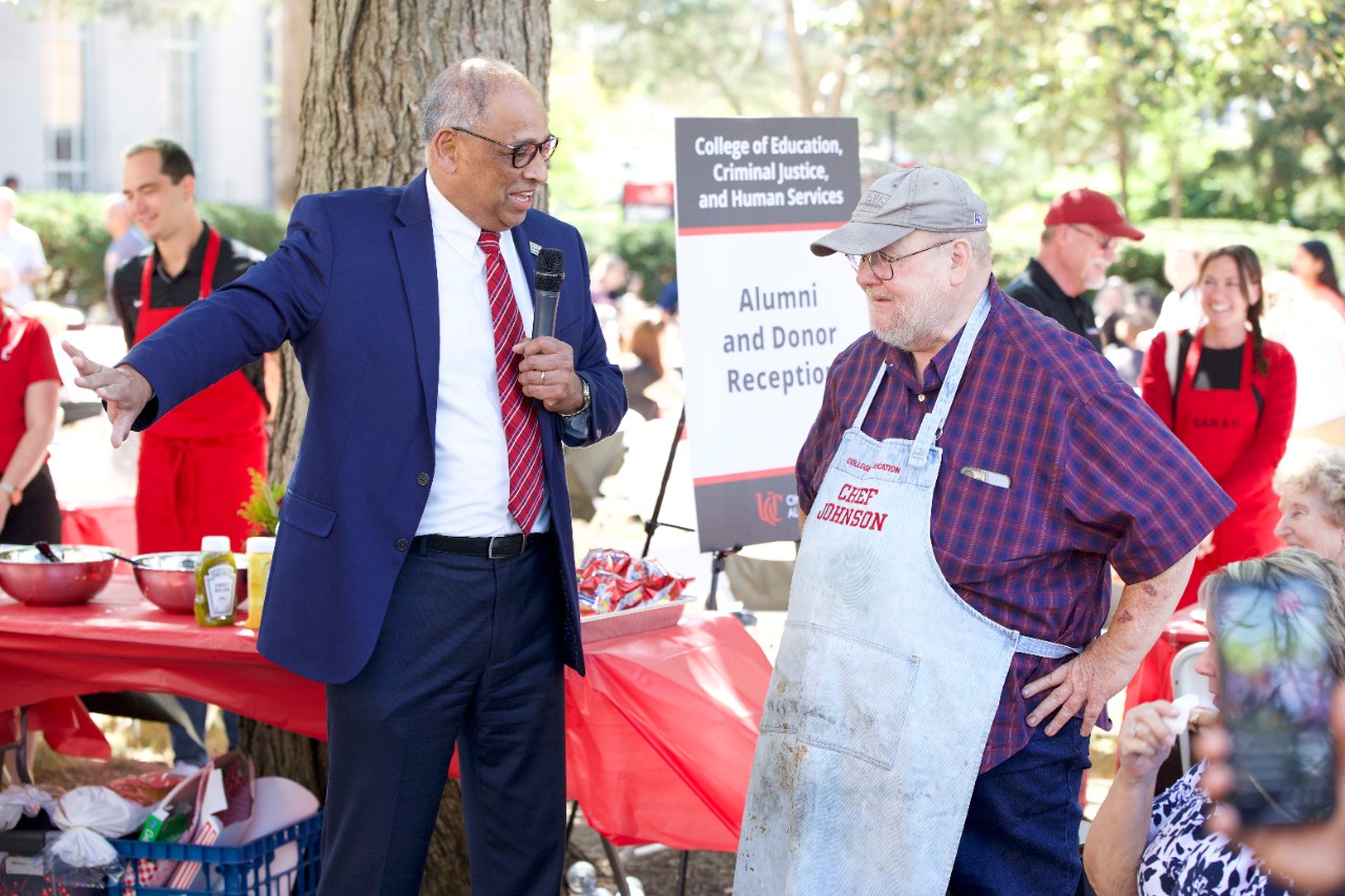 UC President Neville Pinto gives a speech in honor of Dean Lawrence Johnson 9/15.  Photo via CECH Marketing Services