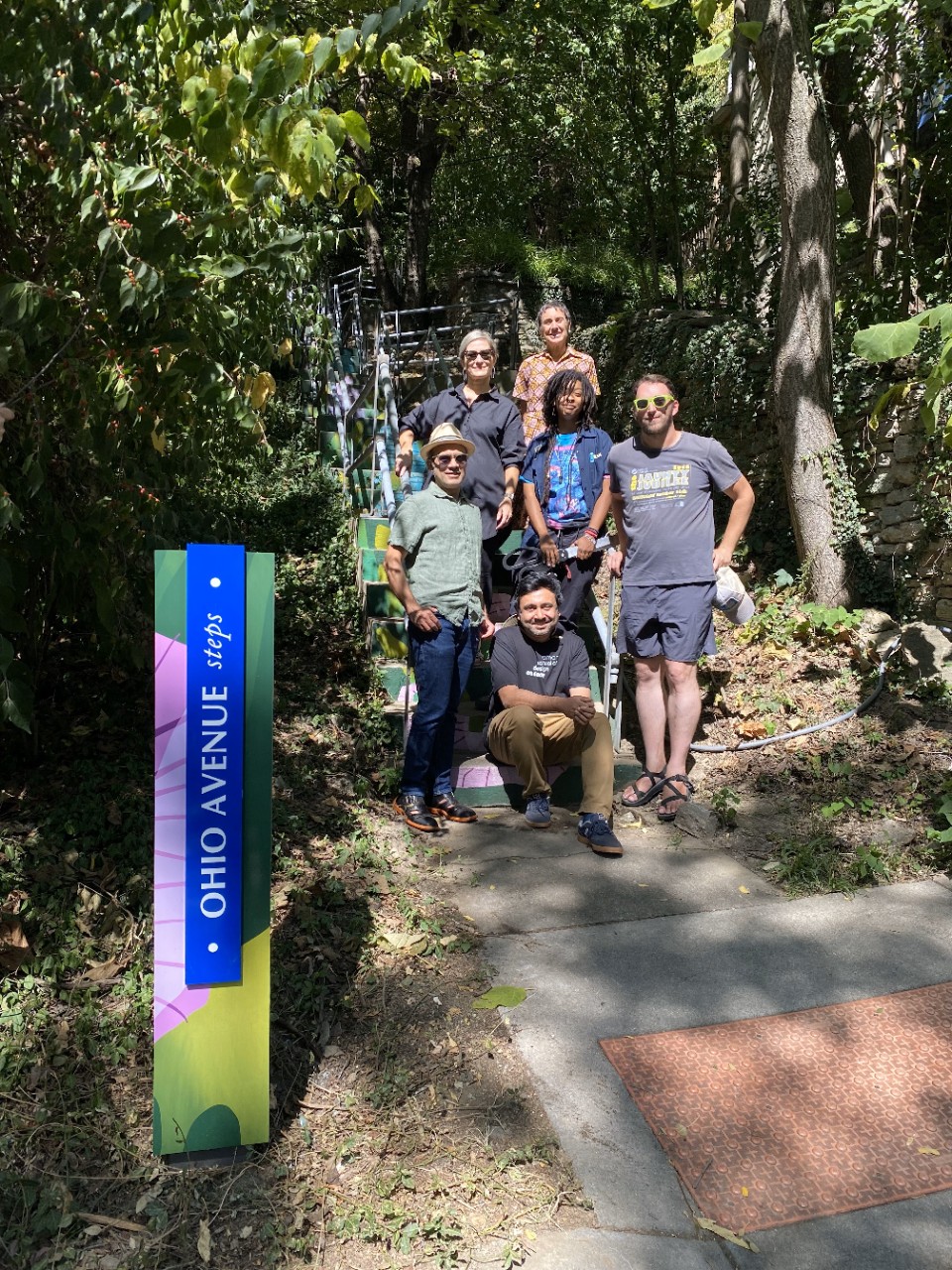 group photo of research team on the Ohio Avenue stairway. 