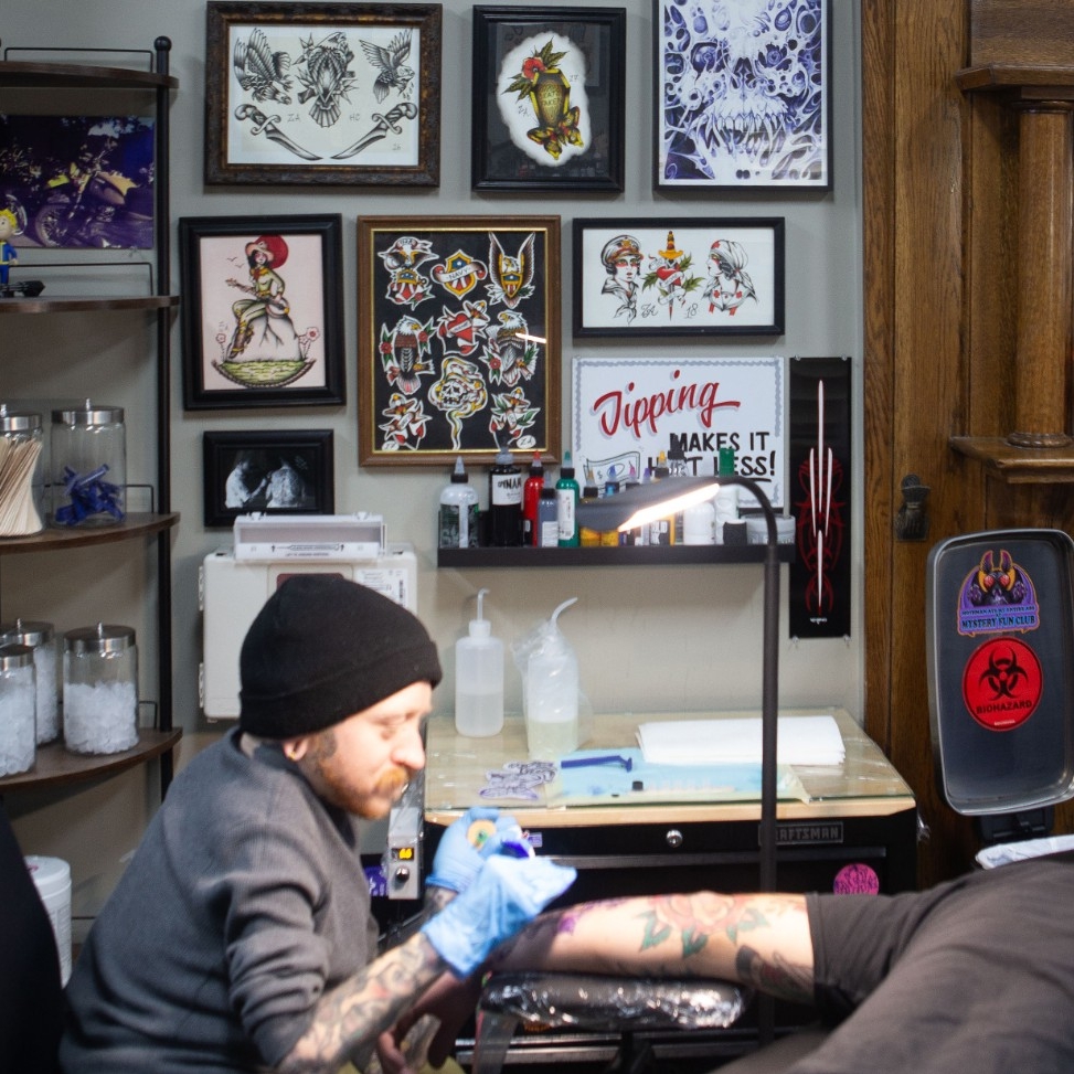 DAAP alumni Dasha and Carter Gilliss apply what they learned as fine art students to an age old artistic practice at their tattoo parlour, Peregrine Tattoo. (This is another tattoo artist who works in the studio, not Carter.)