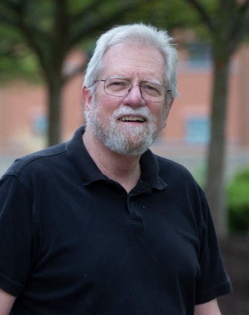 George Uetz poses for a portrait on UC's Uptown Campus.