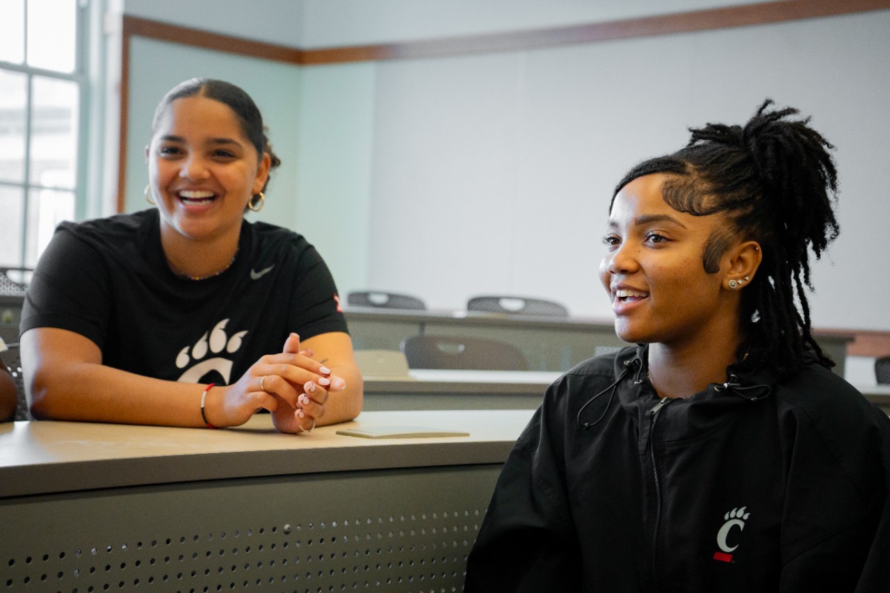 Two BIPOC Teacher Pathway students pictured in classroom.