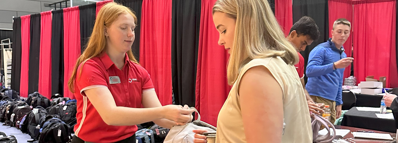 A&S student Bethany See at bag check in at Career Fair
