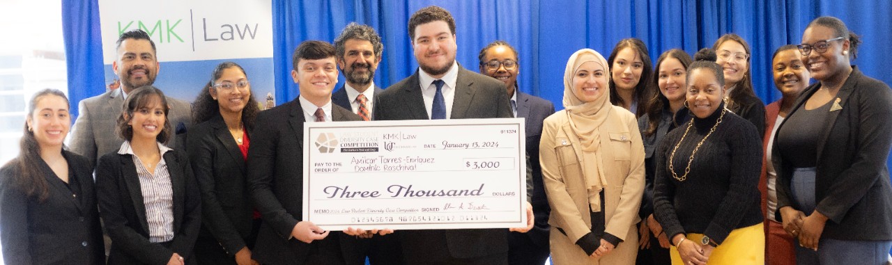 UC Law students at the Diversity Case Competition, along with administration